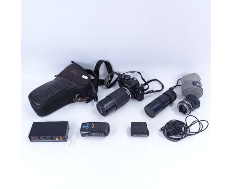 A Vintage Nikon FESLR camera with accessories, including Zoom 70~210mm 1:4, etc 