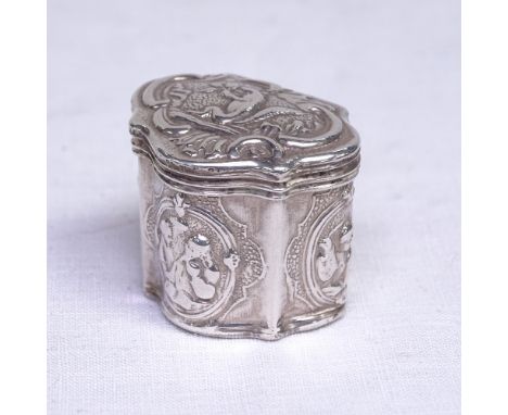 A mid-19th century Dutch silver loderein/vinaigrette box, with shaped cartouche form and embossed panels, hallmarks for Amste