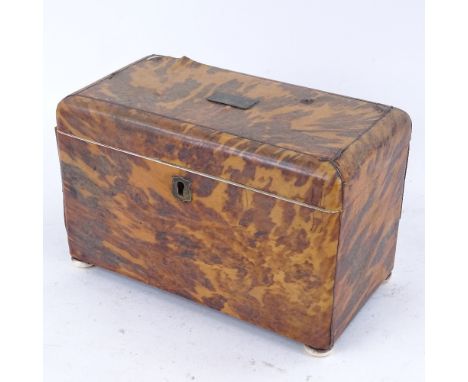 A Regency blonde tortoiseshell tea caddy with velvet-lined lid, 2 inner lids and ivory bun feet, length 21cm 
