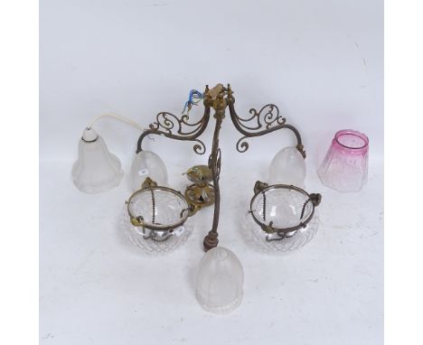 A brass 3-branch chandelier with frosted glass shades, 2 moulded glass ceiling light bowls, and a cranberry glass shade 