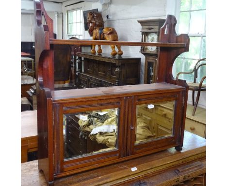 An Edwardian mahogany hanging/free standing shelf unit, with 2 mirrored glazed doors, W62cm, H62cm 