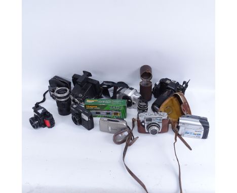 A large collection of various cameras and accessories, including Pentax, Minolta, Kodak etc 