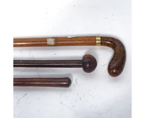 A Malacca walking stick with 14ct gold collar and Bakelite handle, and 2 other hardwood canes (3) 