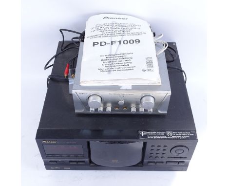 A Pioneer PD-F1009 File-type compact disc player, and a Skytronic Mini AV digital surround amplifier (2) 