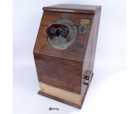 A mid-century Krafts Automatics Ltd coin-in-the-slot stereoscopic viewer arcade machine, oak-cased, case height 57cm (not wor