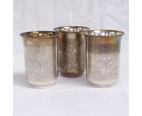 A set of 3 Indian silver beakers, stamped T100 to the underside, height 8cm, 4.8ozs 