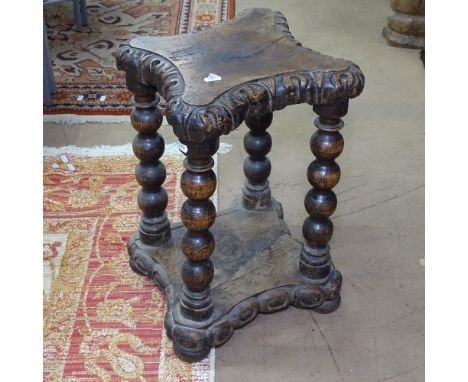 An Antique oak and elm stool, acanthus leaf carved edge on bobbin turned legs, W33cm, H51cm 