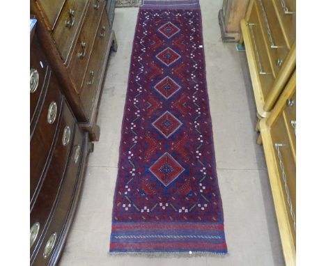 A red ground Meshwani runner, 235cm x 61cm 