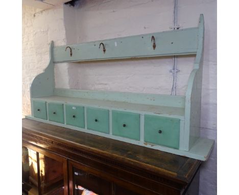 A painted pine hanging shelf, with 6 short spice drawers, L136cm, D23cm, H64cm 