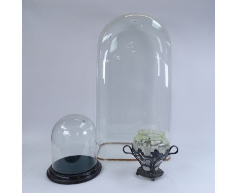 A large dome-top glass dome, another glass dome and base, and an Art Nouveau WMF silver plate and uranium glass vase, largest