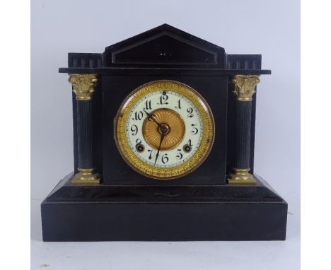 An Ansonia painted cast-iron mantel clock, enamel dial with Corinthian column supports, height 32cm 