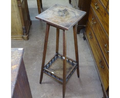 1920s oak jardiniere stand, with spindle gallery shelf, on splayed leg base, H92cm 