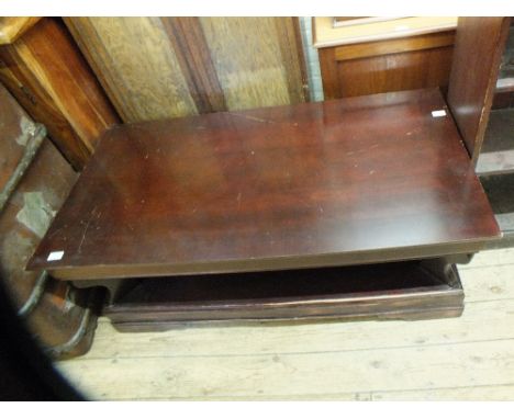 A steamer trunk and a coffee table