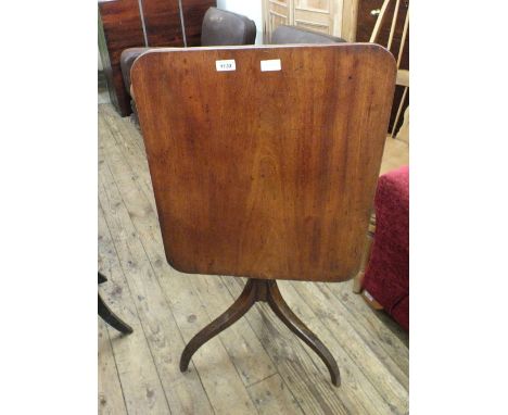 A mahogany snap top rectangular table on tripod base