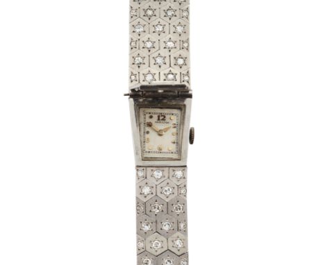 Hamilton. A platinum and diamond set bracelet with concealed manual wind watch Circa 1940 Jewelled manual wind movement, silv