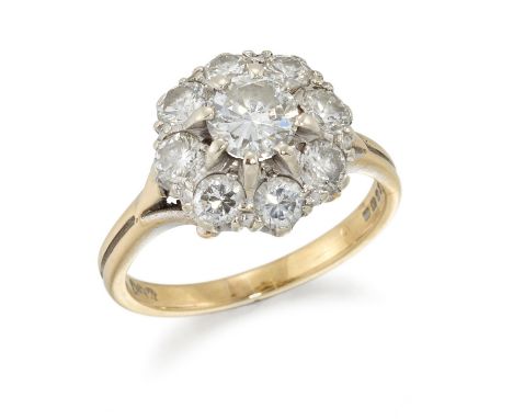 An 18ct gold diamond cluster ring, the central brilliant cut diamond with an estimated weight of approximately 0.60 carats, w