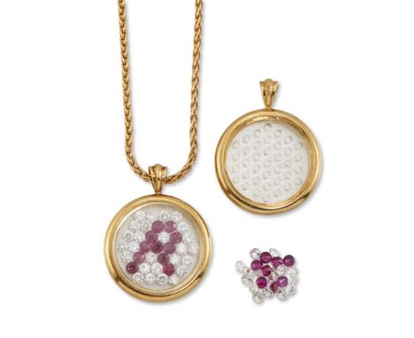 Two 18ct gold mounted glazed locket pendants,&nbsp;one with ruby and brilliant cut diamond initial 'R', suspended on a foxtai