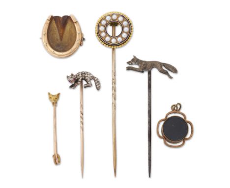 A group of late Victorian jewellery, comprising: a rose cut diamond and ruby fox stick pin, the silver finial with gold pin; 