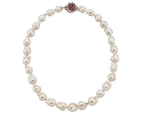 A single row graduated cultured baroque pearl necklace,&nbsp;the cultured pearls approximately 10 to 14mm width, to a ruby cl