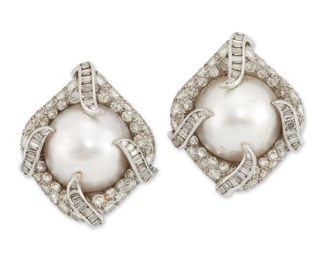 A pair of cultured mabé pearl and diamond earrings, designed as a mabé pearl under baguette cut diamond set claws, to two row
