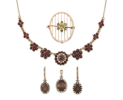 A group of jewellery, comprising: a pair of smoky quartz and diamond oval cluster drop earrings and pendant; a 20th century B