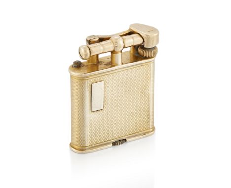 Dunhill. A 9ct gold lighter, with engine turned case and vacant cartouche, the base engraved PAT. NO. 390107, London hallmark
