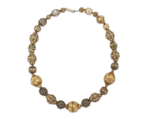 An Italian bead necklace,&nbsp;with a series of silver, silver gilt and gold beads, some with enamel decoration, some of fili