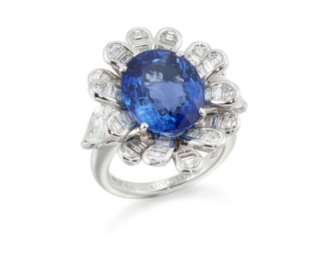 A sapphire and diamond cluster ring, of floral design, with an oval mixed cut sapphire with a stated weight of 9.20 carats, w