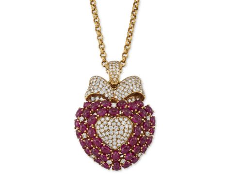 A ruby and diamond heart shaped pendant, with a central pavé brilliant cut diamond set heart, within three row oval cabochon 