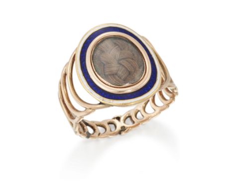 An early 19th century gold and enamel sentimental ring,&nbsp;the oval bezel with woven hair under crystal, within blue and wh