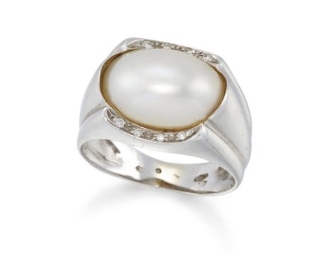 A mabé pearl and diamond ring, an oval mabé pearl with single cut diamonds at each side, to tapering hoop, stamped 750, Czech