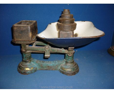 A cast Balance Scales and weights