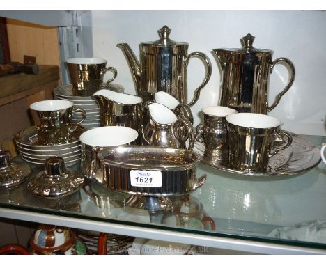 A quantity of mixed silver Royal Worcester tea/coffee sets, a Royal Winton cake plate and slice, Prinknash candlesticks, etc.