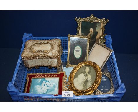 A quantity of vintage photograph frames and a jewellery box.