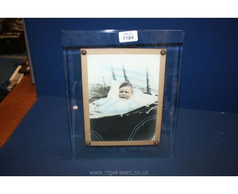 A vintage glass photograph frame.