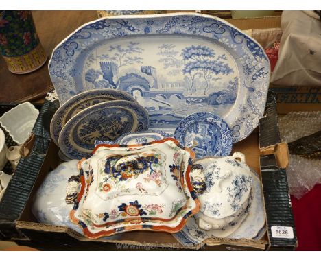 A box of blue and white china including a large meat plate (a/f), willow plates, a Spode teapot (a/f), vegetable dish lids, a