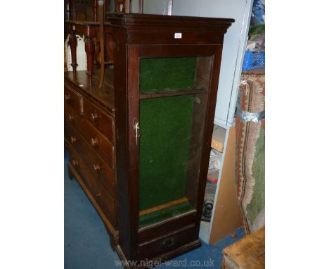 A solid wood Gun Cupboard with glass door and drawer, green baize lined with key, 61" tall x 24" wide x 8 1/2" deep.