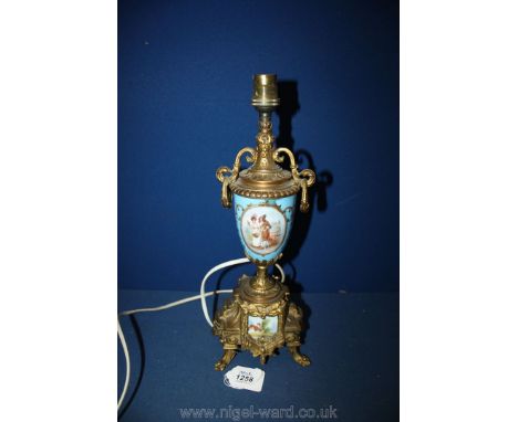 A porcelain and gilt table lamp.