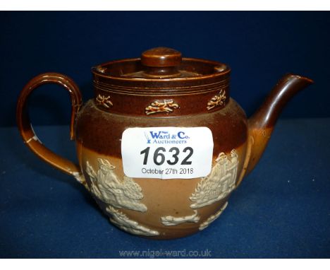 A small Royal Doulton stoneware Teapot with relief hunting scenes.