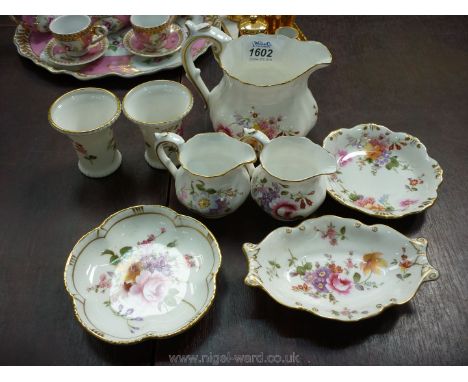Seven pieces of Royal Crown Derby china including a milk jug, two cream jugs, two small vases and two trinket bonbon dishes i