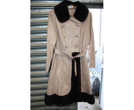 A vintage leather fur trimmed ladies coat, size 10/12.
