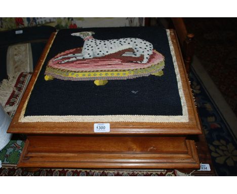 A satinwood framed Footstool/Box footstool of square form, the lid having tapestry panel, very well worked and depicting a re