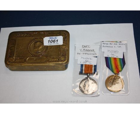 A WWI Victory Medal to; Pte. S.K. Wiles, Durham Light Infantry, a WWI War Medal to; Capt. V. Barker (re-impressed) and a WWI 