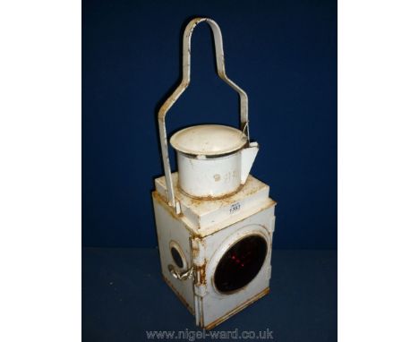 A vintage British Rail lamp with original reservoir and burner.