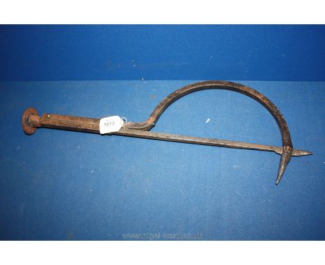 An unusual iron arrow in a sycle moon. c1700, possibly a Thatcher's Needle