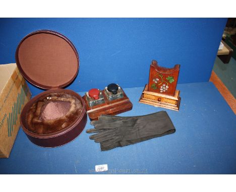 A vintage fur hat, kidskin gloves, size 7 1/4  in a leather box together with a 1930's Art Deco inkwell set with pilot bakeli