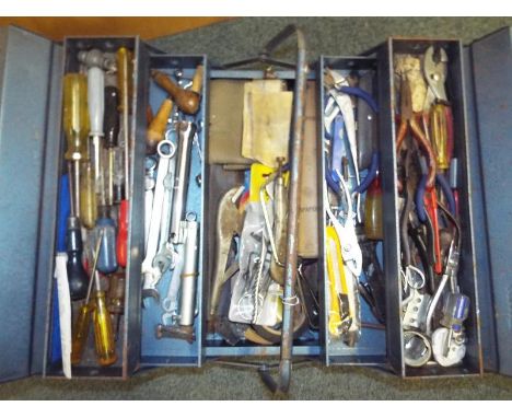 A concertina toolbox containing hand tools