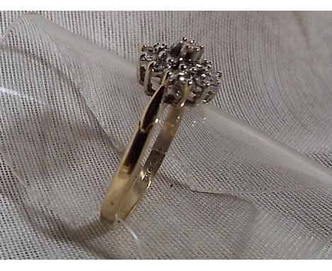 A lady's 9ct gold diamond cluster ring, size K, approximate weight 1.76 grams