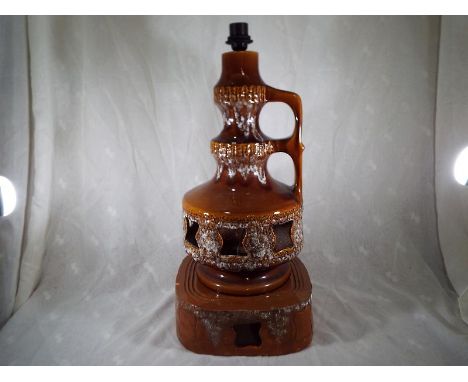 A large mid-century ceramic brown lava lamp with twin lighting and separate base approximately 69cm (h)