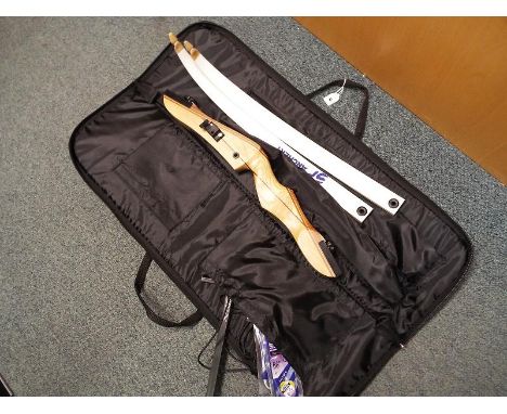 A Mac Accessories bag containing a SF Archery bow, unused